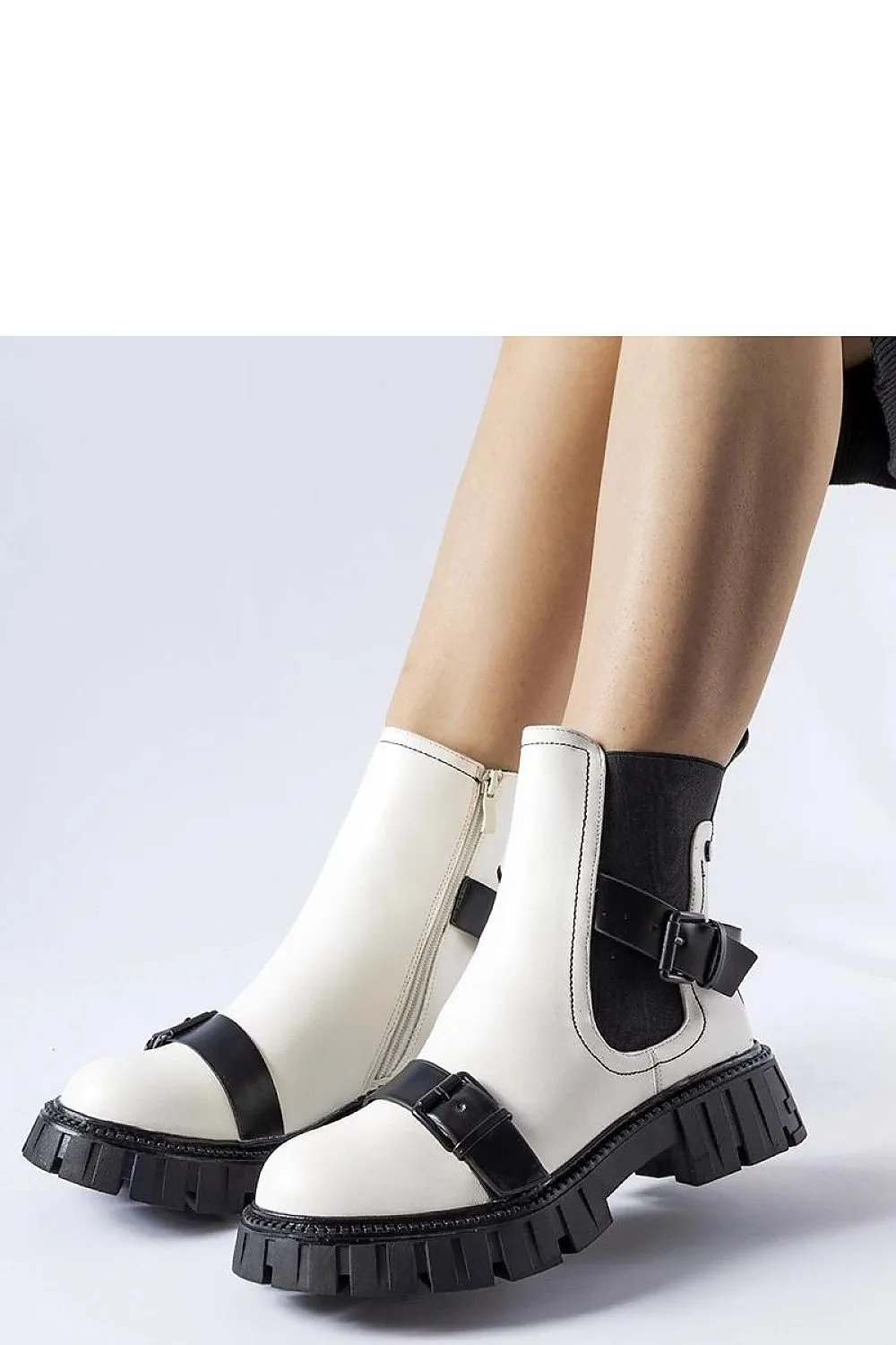 Black ankle heel boots with a massive sole