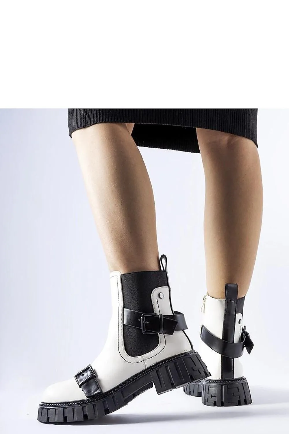 Black ankle heel boots with a massive sole