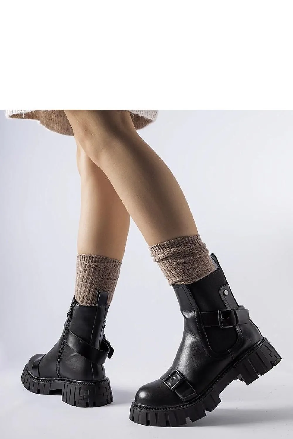 Black ankle heel boots with a massive sole