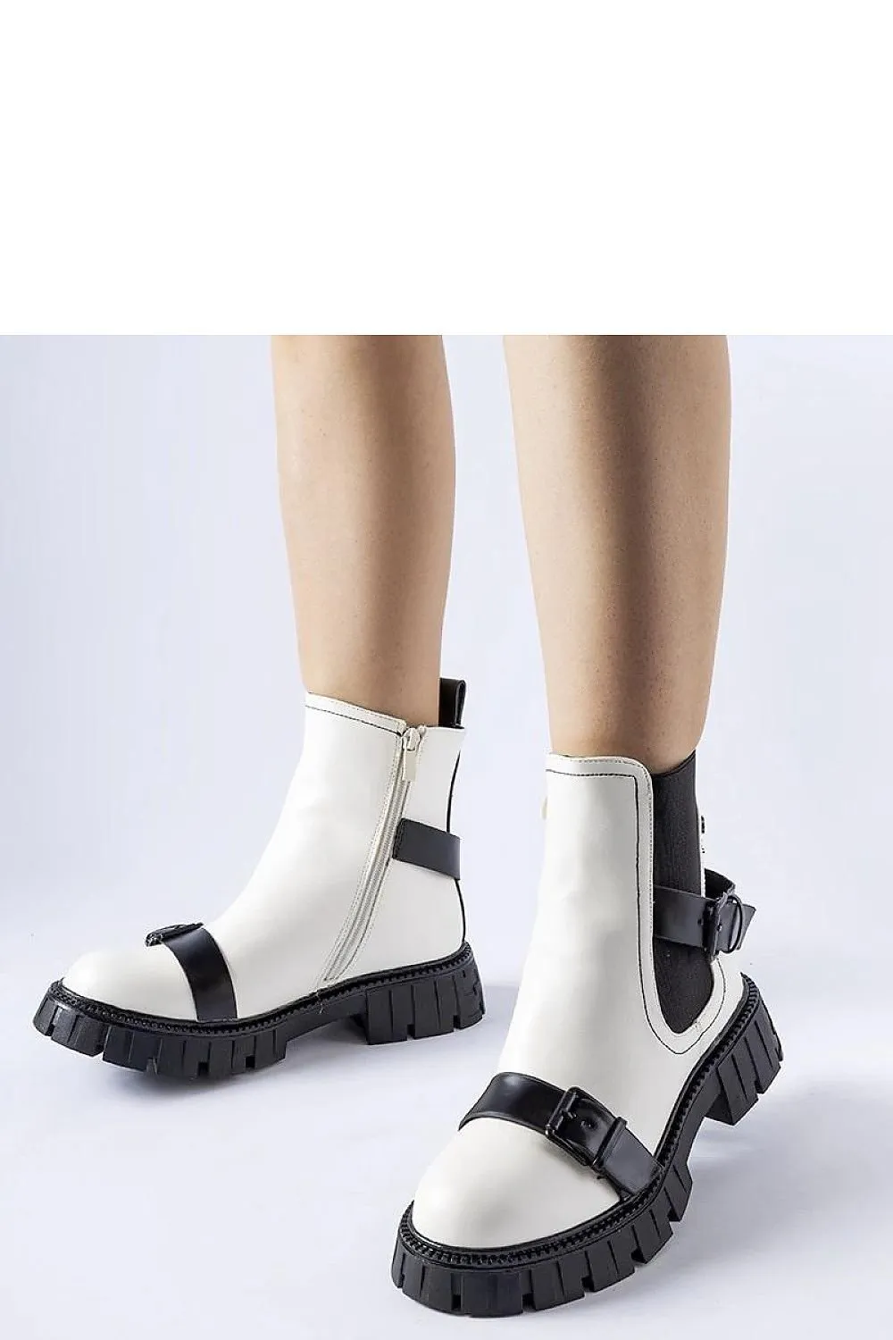 Black ankle heel boots with a massive sole